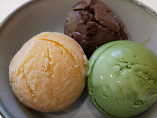 Homemade ice cream, chocolate, mango and green tea