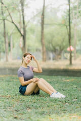 Beautiful Sport woman in sportswear running in the park. Healthy lifestyle and sport concept.