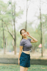 Beautiful Sport woman in sportswear running in the park. Healthy lifestyle and sport concept.