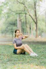 Beautiful Sport woman in sportswear running in the park. Healthy lifestyle and sport concept.