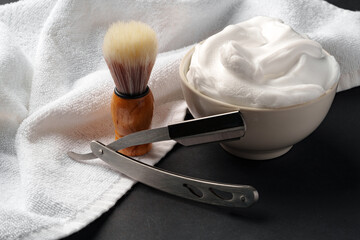Traditional Wet Shaving Gear Arranged on a Dark Background With Morning Light