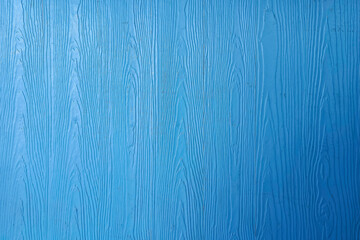 The surface has a blue wood pattern that imitates nature.