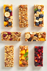 A row of six different kinds of fruit and nut bars