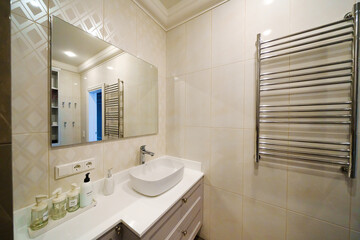 Interior of a bright bathroom in a house or apartment.