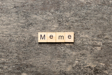meme word written on wood block. meme text on table, concept
