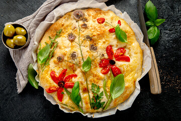 Focaccia art. Italian bread on dark background