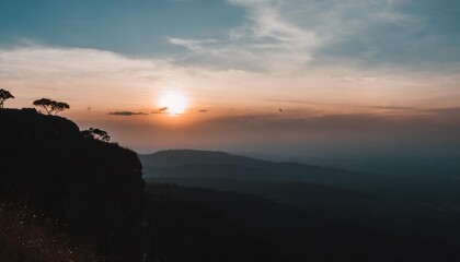 backgrounds of inspire concept top of blue and orange mountain with sunshine sky sunset landscape mak duk cliff phu kradueng national park loei thailand asia