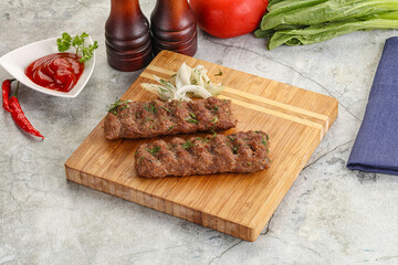 Kebab with beef served onion