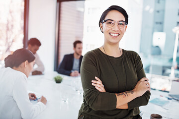 Portrait, professional woman and happy at desk for leadership, motivation and startup company. Pride, planning and management in workplace for career, staff and businesswoman with glasses in office.