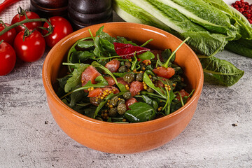 Salad with salmon and arugula