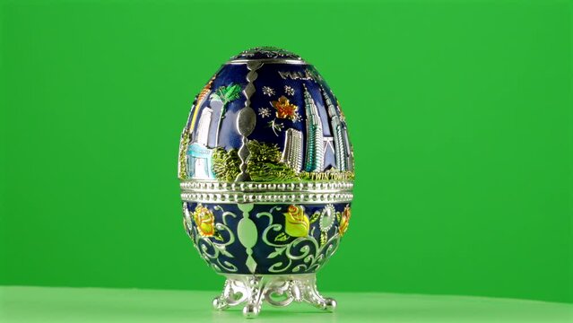 Malasya Kuala Lumpur Faberge egg souvenir memory blue petrona twin towers klcc on green background chroma key background replacement backdrop objet in a turntable 3d spinning loop