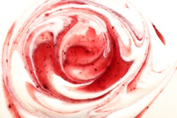 Tasty yoghurt with jam as background, top view