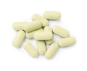 Vitamin pills isolated on white, top view