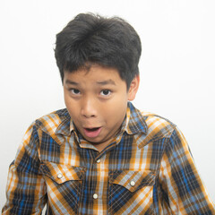 Obraz premium funny child making crazy faces on white background