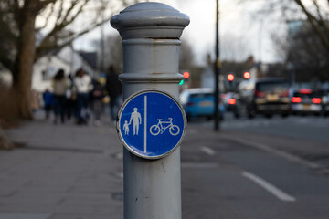 Traffic sign indicating a pedestrian walkway and a cycle path