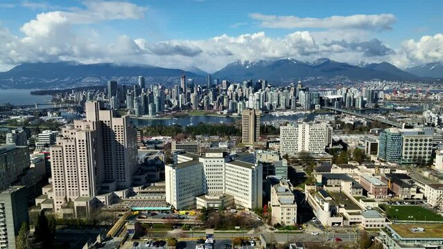 Downtown Vancouver And False Creek Seen From Fairview In Vancouver, BC, Canada. - aerial descend