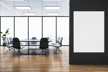 Modern light meeting room interior with wooden flooring, empty white mock up banner on wall, furniture and panoramic window with city view. 3D Rendering.