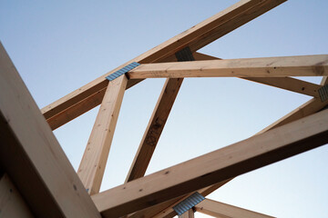 Detailed photo of the roof structure. It is made of wooden beams.