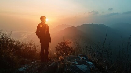 Obraz premium business male stand and feel happy on the most hight on the mountain, hiking, success, cliff, peak, business, success, successful, goal, victory, achievement, motivation,