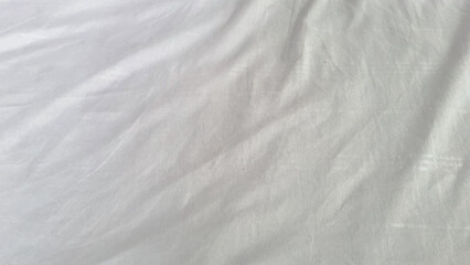Photograph of white cloth for covering dining tables and bedding in residential homes. snow white...
