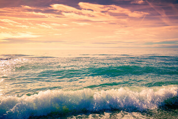 Seascape in the early morning. Sunrise over the sea. Surf line. Nature landscape