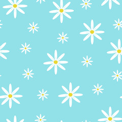 Seamless pattern with different sized buds of summer flowers. Chamomiles on a blue background