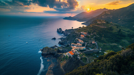 Naklejka premium A picturesque small town perched on a cliff beside the ocean, with a stunning aerial view at sunset. The natural landscape includes mountains, water, clouds, and a colorful dusk sky