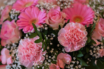 Bouquet of pink carnations and gerberas in a wedding arrangement