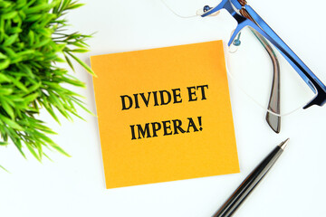 Latin quote Divide et impera meaning Divide and conquer. the best method of governing such a state...