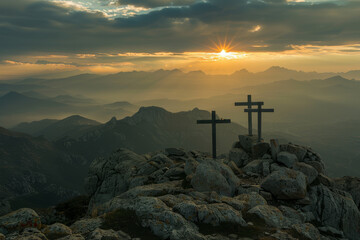 Three crosses on top of a mountain at a beautiful sunrise. Crosses in the mountains.