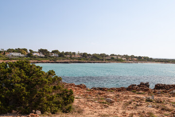 View of the beach of Son Xoriguer and Punta Titina in Minorca.
