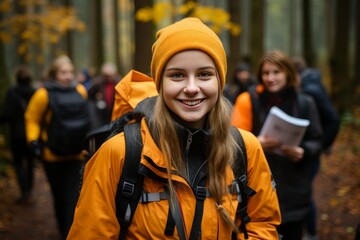 Confident female civil engineer with drawings on a busy construction site, showing leadership and experience in the field. Women&#039;s work and professionalism