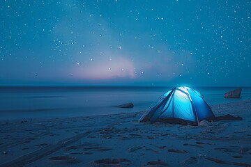 a tent on a beach at night - obrazy, fototapety, plakaty