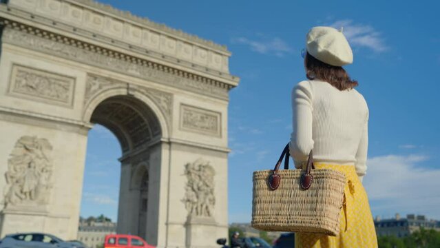 Tourist with Basket Viewing Arc de Triomphe