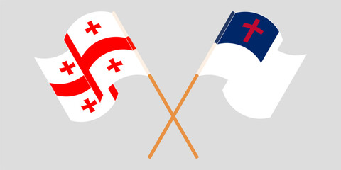 Crossed and waving flags of Georgia and christianity