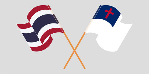 Crossed and waving flags of Thailand and christianity