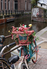  Old colorful bicycle in De Wallen - called the red light district. It is famous for its entertainment character