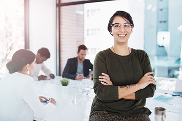 Professional, portrait and happy woman at desk for leadership, motivation and startup company. Team, planning and management in workplace for career, staff and business female with glasses in office.