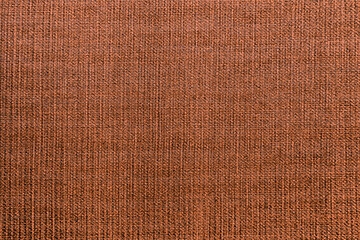 texture of a fabric. brown background
