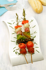 Skewers with rosemary.