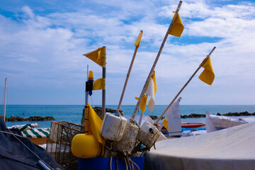 Fishing floats with yellow flags - obrazy, fototapety, plakaty