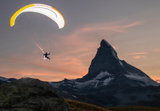 Paragliding at sunset near the iconic Matterhorn peak