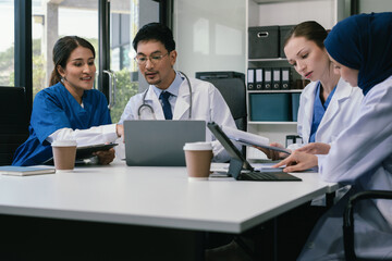 Doctor team, analysis the blood test examination results and medication usage of the patient on the chart, medical check-up concept.