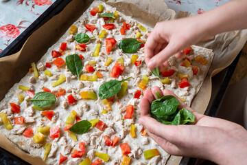 The process of making homemade pizza, selective focus
