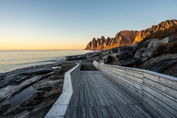 Scenic view of Devil's teeth rocky mountains in Senja, Tungeneset, at sunset