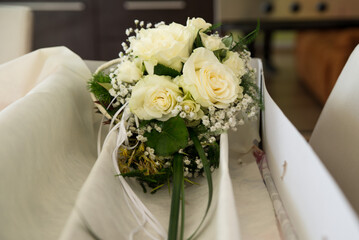Beautiful bouquet with white roses for a bride