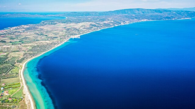 Aerial view of the blue sea and the shore