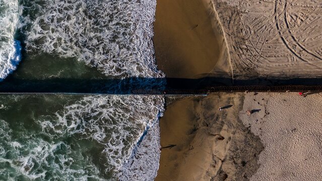 Aerial shot of border wall between the United States and Mexico, Tijuana