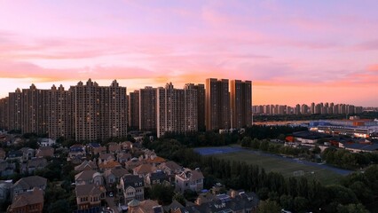 Fototapeta na wymiar Aerial view of a modern community at sunset