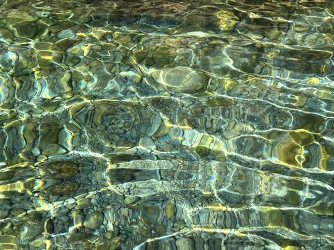 Pebbles and stones in sea bottom natural beauty.